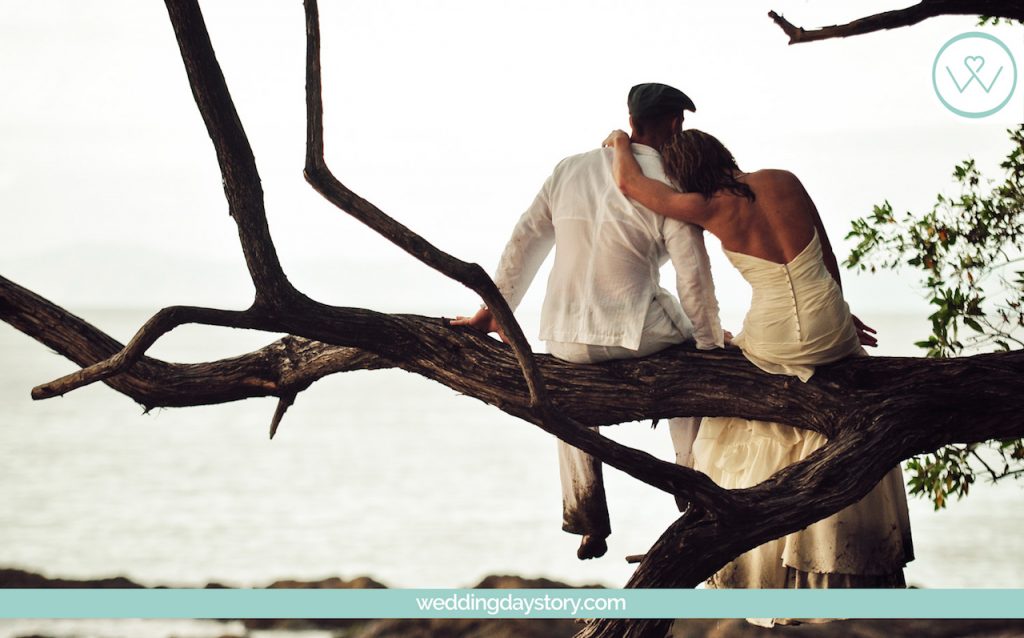 Liz Moore Weddings loves this couple in tree after destination wedding by WeddingDayStory Photography