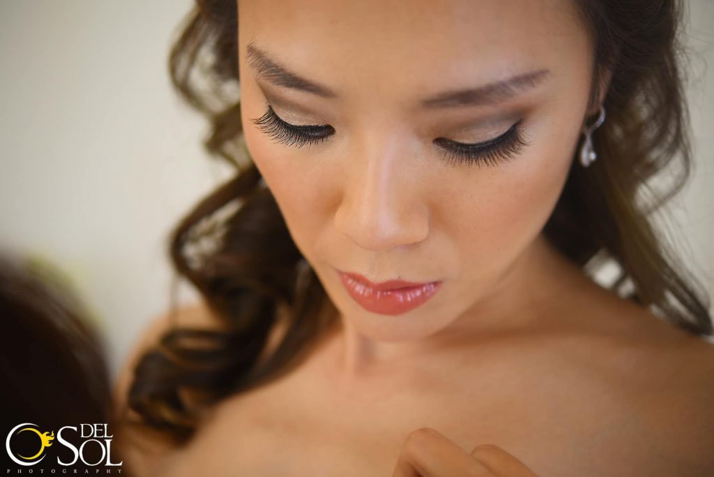 Bride having a great day with her makeup courtesy of Styling Trio