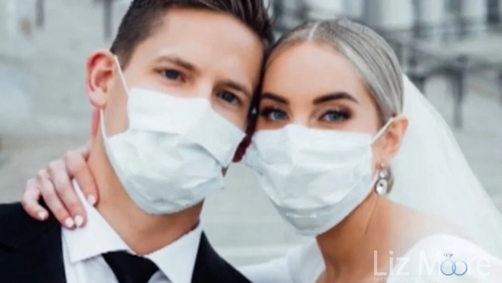 bride-and-groom-wearing-masks-at-their-wedding