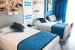 Hotel-Riu-Dunamar-Costa-Mujeres-double-bed-bedroom
