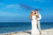 Secrets Playa-Mujeres-Golf-And-Spa-beach-wedding-couple