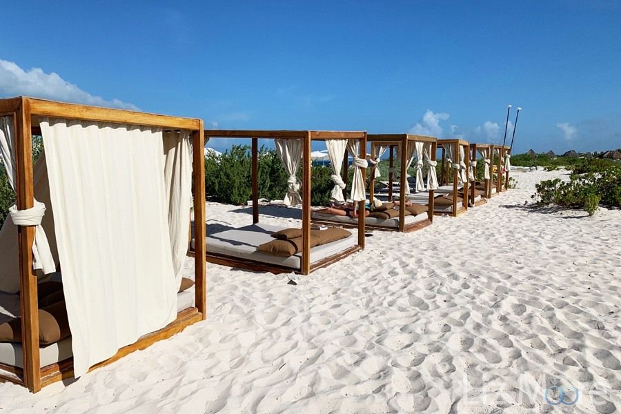 Beach front Cabanas With double seating for two guests right on the white sandbeach