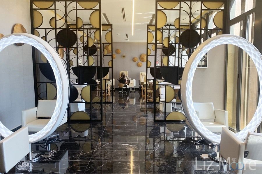 Main resort beauty salon with Manny and petty station shares and white large mirrors