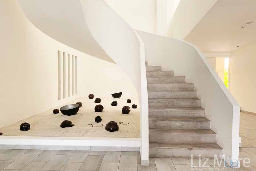 white stairway to spa treatment rooms