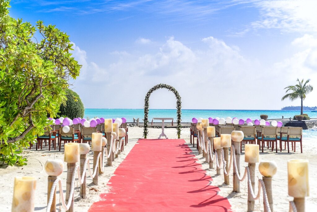 red runner, wedding chairs gazebo on beach