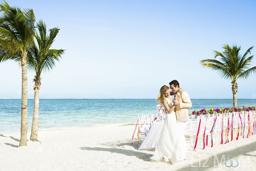 Excellence-Playa-Mujeres-Wedding-couple-on-beach-qbn0fn0x7i52r2f9vkfclggvbuvezjd18fsivcu5mo