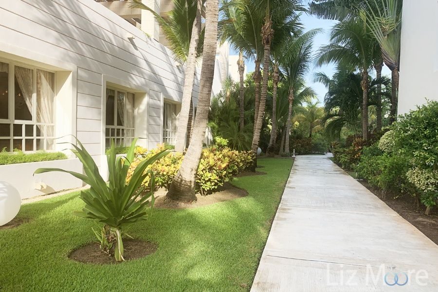 Excellence-Playa-Mujeres-garden-walkway-qbn0eyl49t7md7eru9v1smmvvu7vfeo0h2twe5ue4g