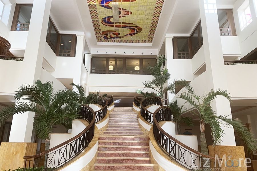Excellence-Playa-Mujeres-lobby-stairway-area-qbn0er2er4xbsbpp26m18oj74r8xptu5s1m0jy5ji8