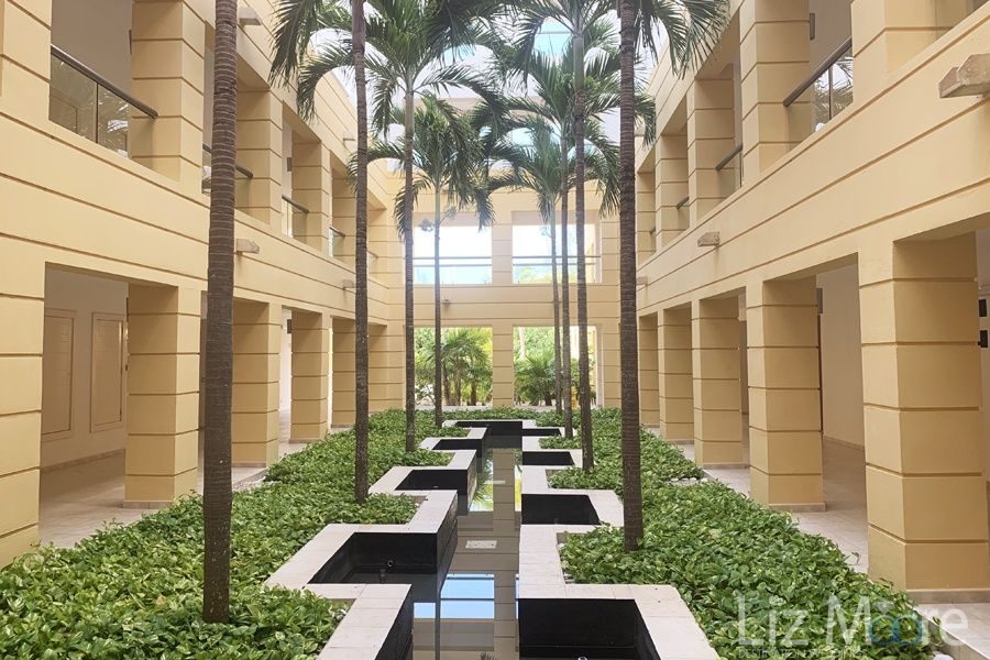 Excellence-Playa-Mujeres-room-walkway-qbn0ekhjfaobj1z94lrn986yz25d7y41f51m70faps