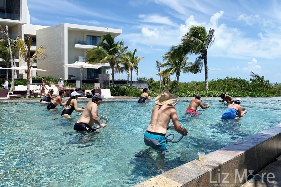 TRS-Coral-Costa-Mujeres-pool-cycling-class-qbn0o6eg90smk9dtqayqzjzrganadde2zgybwtqsmo