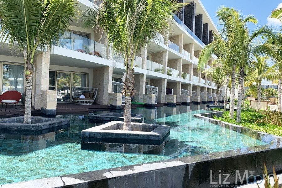 TRS-Coral-Costa-Mujeres-room-swim-out-area-qbn0o6eg90smk9dtqayqzjzrganadde2zgybwtqsmo