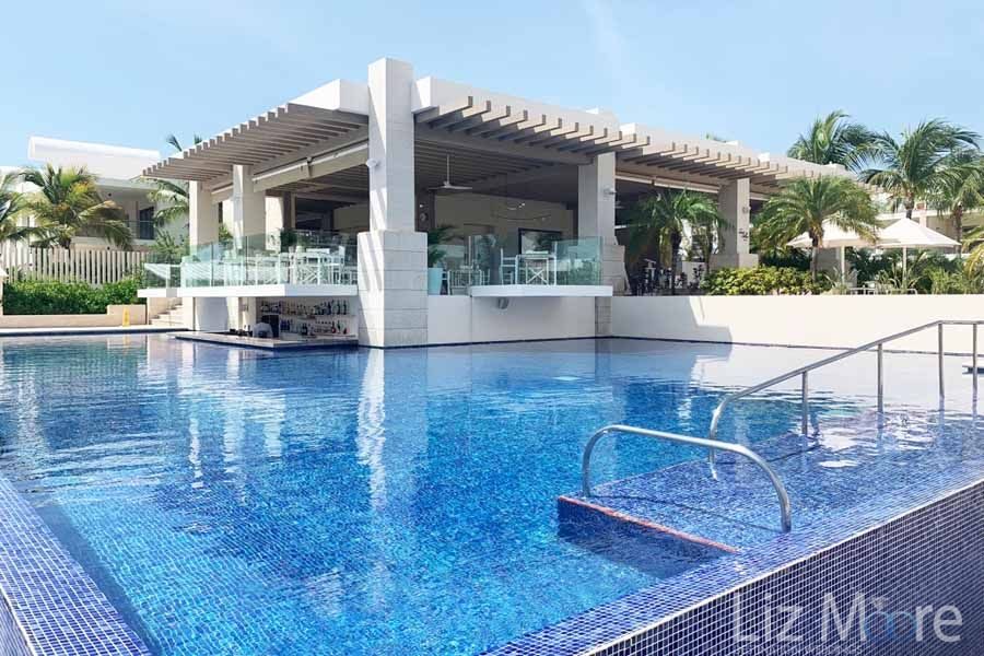The-Beloved-Hotel-Playa-Mujeres-swim-up-bar-qbn06cedmhezxvxc5js5xswruooqvaglafjo0umb5s