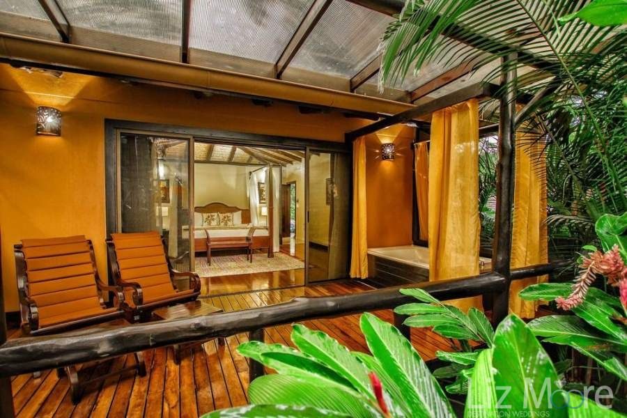 Nayara-Resort-Spa-and-Gardens-Bedroom-Deck-qbmzsvdymnxtvsuvj9t2fye37ay70a3x0ir5i25tv4