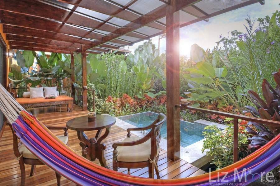 Nayara-Resort-Spa-and-Gardens-Pool-Deck-qbmzsgcjlbd8q1gpz3b1c26pp50bl4g7mgbdtms4mo