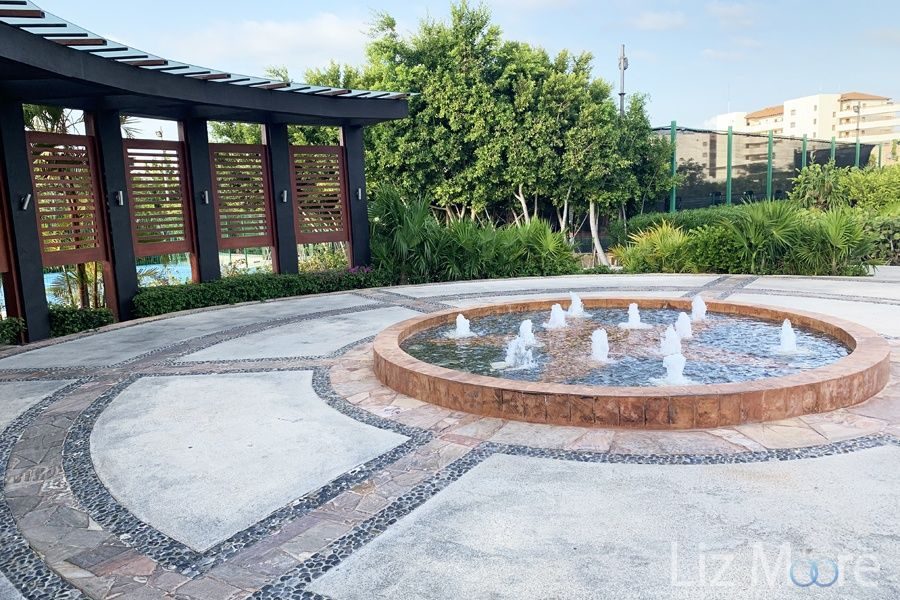 Secrets-Playa-Mujeres-Golf-And-Spa-grounds-with-waterfall-display-qbn070u6k6cgbqxu6ucgqmqrapcaff5m1siai1m2o0