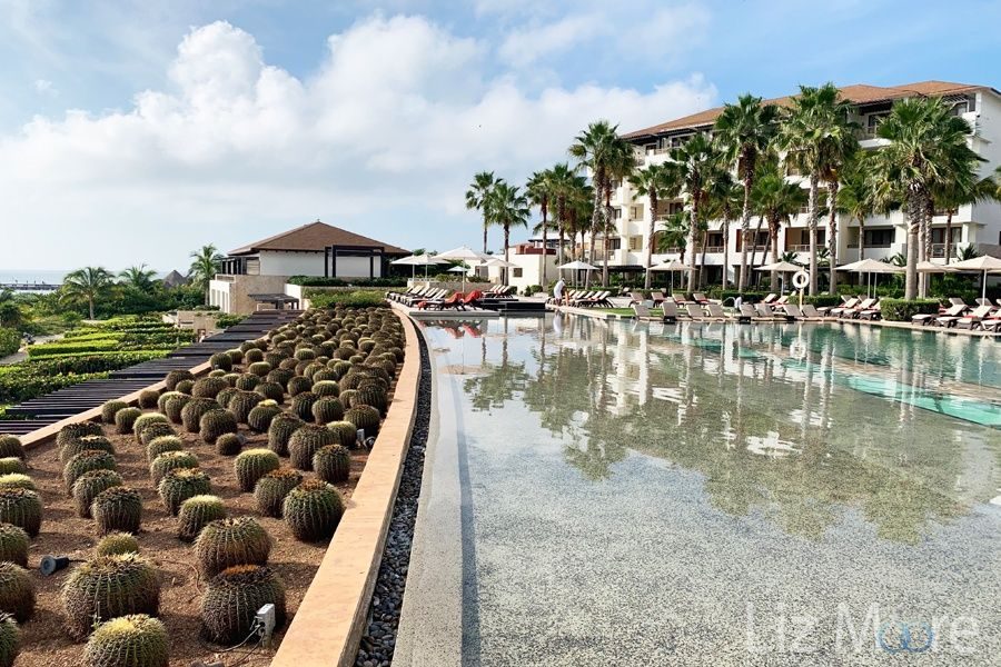 Secrets-Playa-Mujeres-Golf-And-Spa-infinity-pool-area-qbn06y0nzo8lcx1xnb4l15gdijq6sbuf1eju27q96o