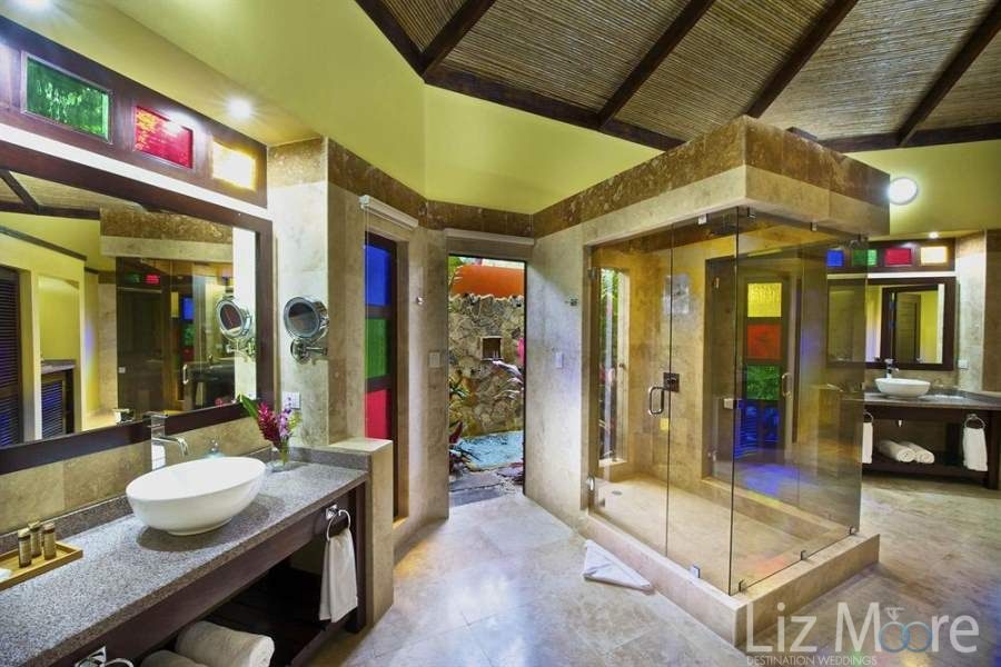 Nayara-Resort-Spa-and-Gardens-Bedroom-Shower-and-Bath.jpg